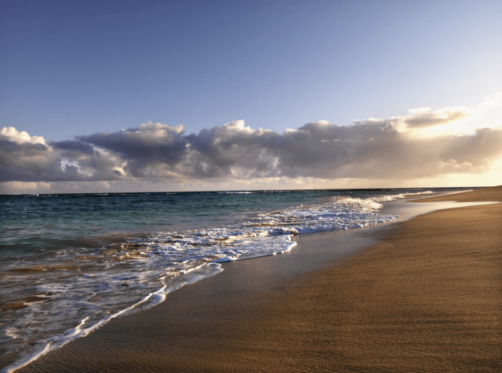 Ocean waves on sandy beach