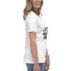 Woman wearing white printed T-shirt, side view