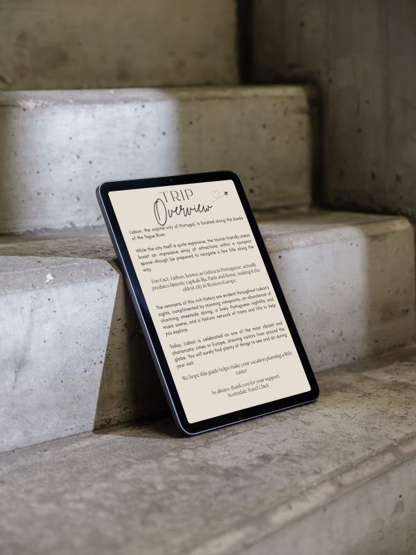 Tablet displaying travel guide on concrete steps.